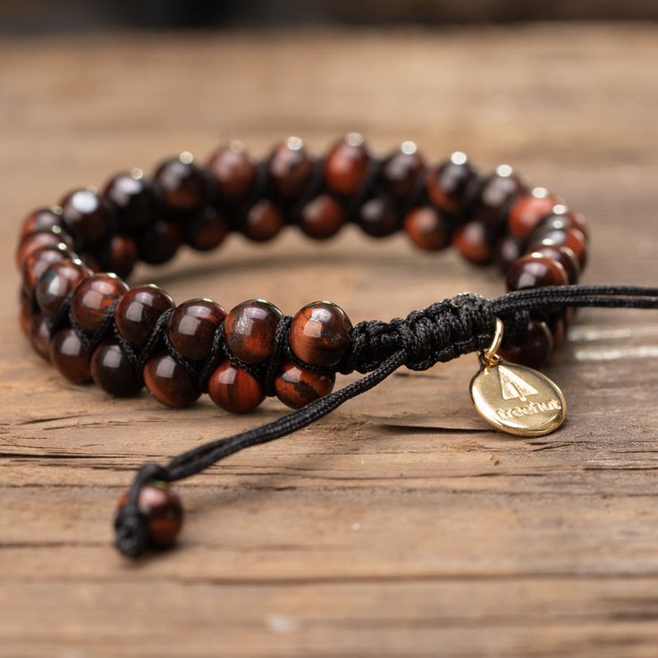 Double layers of the dark-hued and fierce brown and yellow tiger's eye stone beaded together with a high-quality elastic stretch cord for an easy-to-slip-on and chic look. • Materials: Natural Tiger's Eye Stone • Size: 6'' - 8" Adjustable (Single Wrap) • Made with Love and Carefully Manufactured Casual Brown Beaded Bracelets With Gemstone Beads, Casual Brown Beaded Bracelets With Gemstones, Hand Wrapped Brown Beaded Bracelets For Meditation, Adjustable Brown Beaded Bracelet With Gemstone Beads, Adjustable Brown Gemstone Beaded Bracelets, Casual Brown Gemstone Beads Bracelets, Casual Brown Bracelets With Gemstone Beads, Adjustable Hand-strung Brown Beaded Bracelets, Adjustable Brown Hand-strung Beaded Bracelets