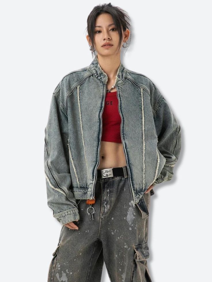 This Cyberpunk Zip-Up Denim Jacket offers a bold, industrial look with exposed seams and distressed detailing. Its oversized fit pairs perfectly with cargo pants or ripped jeans for versatile streetwear style. Cyberpunk aesthetic Denim material Zip closure at front Zip detail at sleeves Button detail at cuffs Tasseled detail Mandarin collar Long sleeve Cotton, polyester Our model wears L and is 5'4 (166cm) Ripped Dark Wash Outerwear For Streetwear, Urban Ripped Outerwear For Streetwear, Ripped Denim Jacket For Streetwear, Distressed Denim Jacket For Streetwear, Ripped Long Sleeve Denim Jacket For Streetwear, Ripped Denim Jacket For Urban Streetwear, Distressed Dark Wash Denim Jacket For Streetwear, Distressed Denim Jacket For Fall Streetwear, Denim Jacket With Multiple Pockets For Fall Streetwear