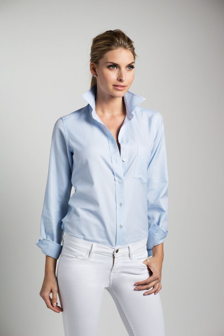 PALE BLUE TWILL FABRIC Fall in love with this sublime baby blue, in a discerning diagonal twill weave. As fresh as it is serene, this color flatters all who wear it. 100% Italian Cotton THE WEEKEND SHIRT The Weekend Shirt embodies the carefree spirit of Saturdays and Sundays that you will enjoy and wear 7 days a week. Dress it up or down with your favorite jeans, edgy leather pants or a chic pencil skirt—it’s your go-anywhere, do-anything shirt. Sartorially influenced by menswear, this classic s Popped Collar, Serenity Blue, Into The Blue, Professional Women, Menswear Inspired, White Shirts, Blue Blouse, Pale Blue, Favorite Jeans