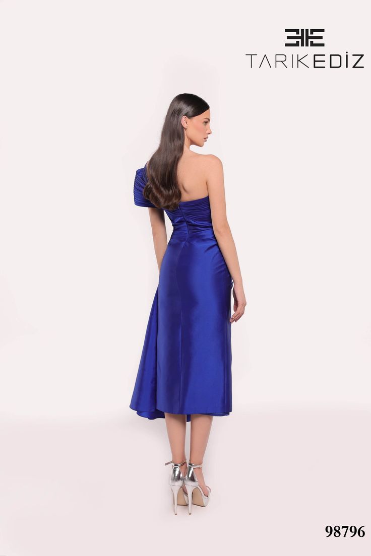 Tarik Ediz 98796 Fall 2024 evening collection dress. Made with Tafetta fabric. Pre-draped One Shoulder Evening Dress For Gala, One Shoulder Pre-draped Satin Party Dress, Fitted Pre-draped Gala Dress, Fitted A-line One Shoulder Dress For Formal Occasions, Luxury A-line Midi Dress For Party, Luxury Strapless Satin Dress, Pre-draped Floor-length Silk Evening Dress, Pre-draped Silk A-line Evening Dress, Evening Satin One-shoulder Dress With Fitted Bodice