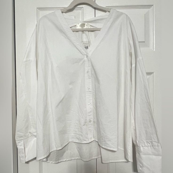 New With Tags, White Button Down Blouse With Double Buttons On Cuffs V-neck Top With Button Cuffs For Day Out, White Tops With Button Cuffs For Day Out, Cotton Button-up Shirt For Brunch, V-neck Tops With Button Cuffs For Day Out, V-neck Tops With Button Cuffs For Daywear, V-neck Top With Button Cuffs For Daywear, Cotton Buttoned Blouse For Brunch, Cotton Button Blouse For Brunch, Cotton Button-up Blouse For Brunch