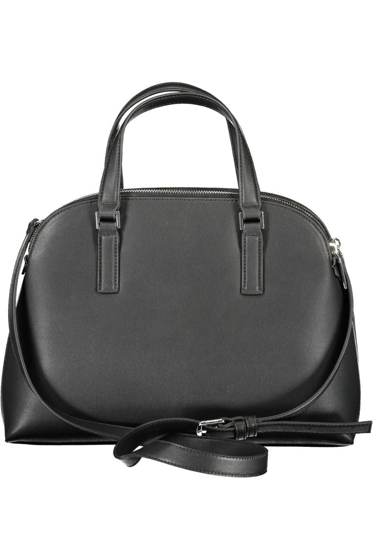 Experience the epitome of urban chic with this Calvin Klein masterpiece. Expertly crafted with sustainability in mind, it boasts a 51% polyester and 49% polyethylene blend that exudes sleekness. Designed for the modern woman, this handbag features two handles ensuring versatility and comfort with its adjustable and detachable shoulder strap. It’s not just about looks; functionality is key with three distinct compartments and an internal pocket for your essentials. Secure your possessions with th Modern Calvin Klein Business Bags, Modern Business Satchel With Round Handle, Calvin Klein Classic Shoulder Bag, Modern Calvin Klein Shoulder Bag For Business, Modern Business Shoulder Bag, Modern Business Bags With Handles, Modern Shoulder Bag With Round Handle For Business, Classic Calvin Klein Satchel Shoulder Bag, Calvin Klein Adjustable Strap Shoulder Bag