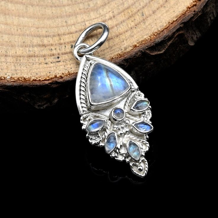 925 Sterling Silver Pendant Studded With Rainbow Moonstone   Product Details :- Gemstone : Rainbow Moonstone Gemstone Shape : Fancy Gemstone Color : White Pendant Length : 30 mm Pendant Width : 25 mm Gemstone Finish : Smooth Weight : 4.00 Gram Metal : 925 Sterling Silver (925 Stamped) Can Be Personalized : Yes We provides free shipping worldwide. Rainbow Moonstone Benefits : Moonstone is good for activating your creative and intuitive power of feminine energy which helps you get in tune with you Moonstone Pendant Jewelry Stamped 925, Fusion Style Moonstone Gemstone Jewelry, Handmade Silver Moonstone Gemstones, Unique Moonstone Jewelry With Gemstone Accents, Artisan Moonstone Jewelry, Unique Moonstone Jewelry With Stones, Silver Moonstone Pendant Gemstones, Natural Silver Moonstone Gemstones, Artisan Silver Moonstone Jewelry