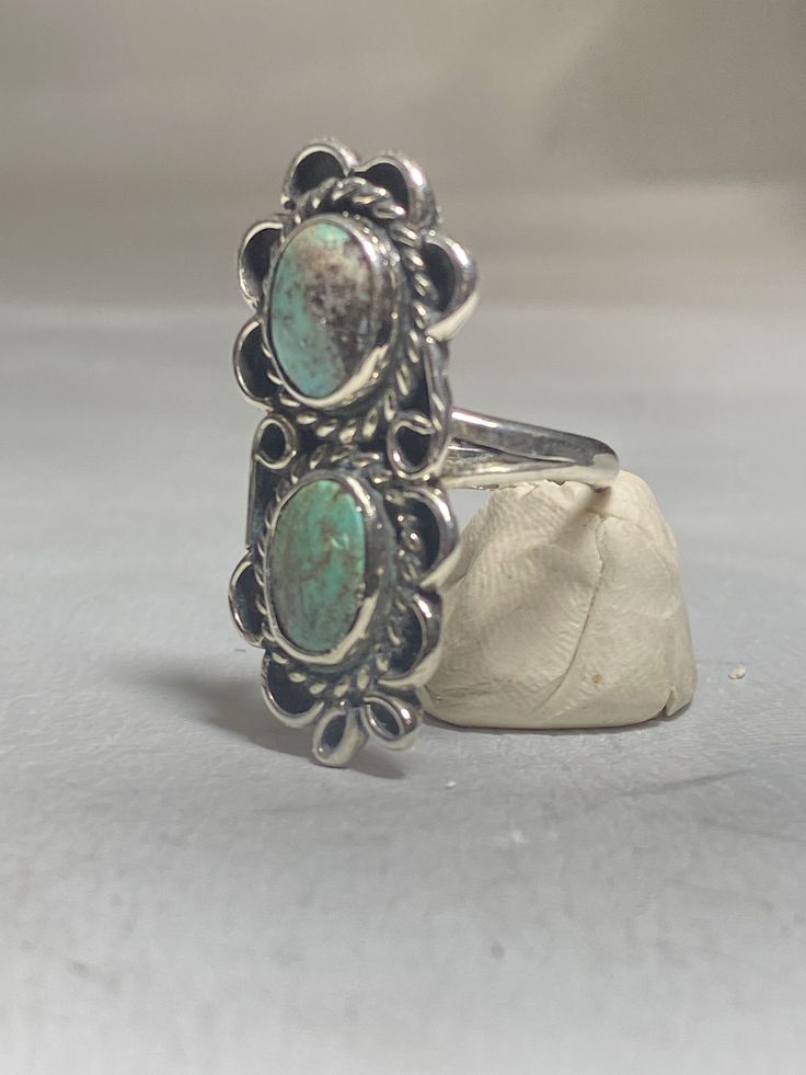 "long Turquoise ring Navajo southwest sterling silver women girls Signed LC Size 4.75 Weight 6.1g Length 1. 3/8\" Width 5/8\" Thinnest part of the band 1/8\" Free Shipping & Free Postal Insurance Delivered in a Gift Box If you do not want the ring polished and want to leave the natural patina please let me know at the time of purchase as I do polish rings before I ship rings out. Thanks USPS Domestic Shipping is free for buyers. If a buyer prefers to upgrade to priority, the buyer will pay t Onyx Ring, Moonstone Ring, Sterling Silver Bands, Silver Band, Unique Rings, Stone Rings, Turquoise Ring, Silver Fashion, Turquoise Bracelet