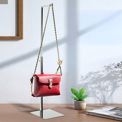 【5 X 5 X 27" L-Shaped Purse Display】 This handbag display rack is made of stainless steel with a polished finish. The L-shaped hook fits any handbag handle without scratching the leather surface, keeping the handbag securely in place without falling off easily. The EVA base ensures stability and prevents slipping, ensuring safe use.【15-27" Adjustable Height】 The base dimensions of this handbag display rack are 5.91 X 5.12 inches (15CM X 13CM) with a thickness of 0.25mm. The height can be adjuste Displaying Purses, Purse Display, Handbag Display, Handbag Holder, Handbag Boutique, Hat Display, Closet Accessories, Handbag Handles, Display Rack