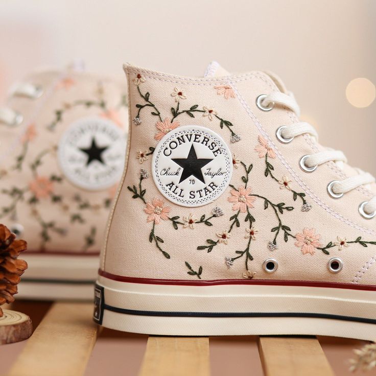 Custom Converse Embroidery, Pink Flower Embroidered Converse Custom, Floral Embroidered Shoes, Custom Wedding Converse Embroidered Flower Floral Converse Lyst, Pink Plant Form Converse, Nike Embroidered Shoes, Converse High Tops Platform Embroidery, Converse Wedding Photo, Bridal Converse Custom, Light Purple Converse Embroidered, Vintage Floral Converse, Floral Converse Custom