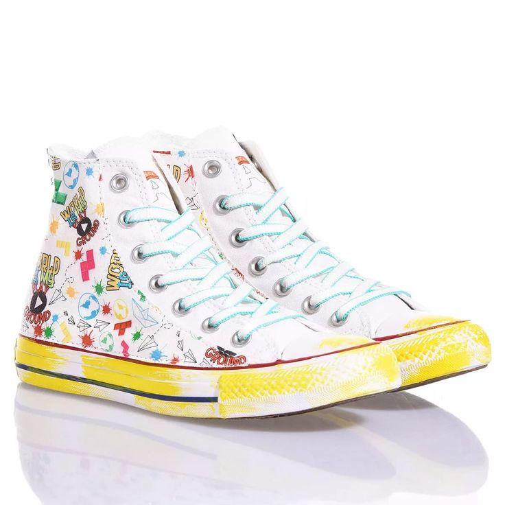 Bring joy with every step in the sneakers collaboration with Silvia & Kids. Converse Playground by Alyssa: the unique and playful design features a colorful pattern on the sides and a yellow brushstroke effect sole, in full Mimanera style. The white laces with turquoise accents add a lively touch. But the true highlight of these sneakers is the customization option. You can indeed add the initial of your name with the cute sushi font, making each pair unique and special. Converse Playground Casual Custom Sneakers With Graffiti Print And Round Toe, Casual Custom Sneakers With Graffiti Print, Casual Multicolor Custom Sneakers With Graphic Print, Hand Painted Multicolor Low-top Sneakers, Multicolor Hand Painted Low-top Sneakers, Multicolor Hand Painted Sneakers For Streetwear, Hand Painted Multicolor Sneakers For Streetwear, Multicolor Hand Painted High-top Sneakers, Multicolor Hand-painted High-top Sneakers