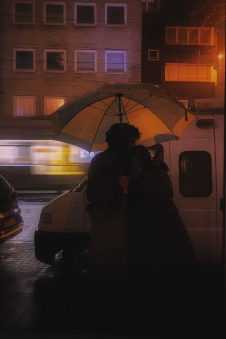 young couple in cologne with an umbrella in the rain Aesthetic Rain Couple, Umbrella Couple Aesthetic, Couple Sharing Umbrella, Couple With Umbrella In Rain, Couple Under Umbrella Aesthetic, Couple In Umbrella, Rain Couple Aesthetic, Couple In Rain Romantic, Sharing Umbrella