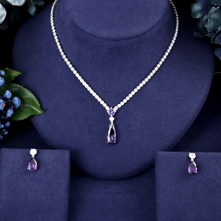 Cheap Purple Jewelry For Formal Occasions, Cheap Modern Purple Jewelry, Cheap Elegant Adjustable Jewelry Sets, Purple Diamond Necklace For Wedding, Purple Diamond Necklaces For Wedding, Purple Crystal Jewelry Sets For Wedding, Purple Diamond Wedding Necklace, Dazzling Purple Jewelry With Diamond Accents, Elegant Purple Cubic Zirconia Jewelry