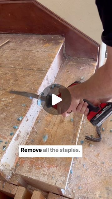 a person using a power tool to remove all the staples from flooring boards and wood