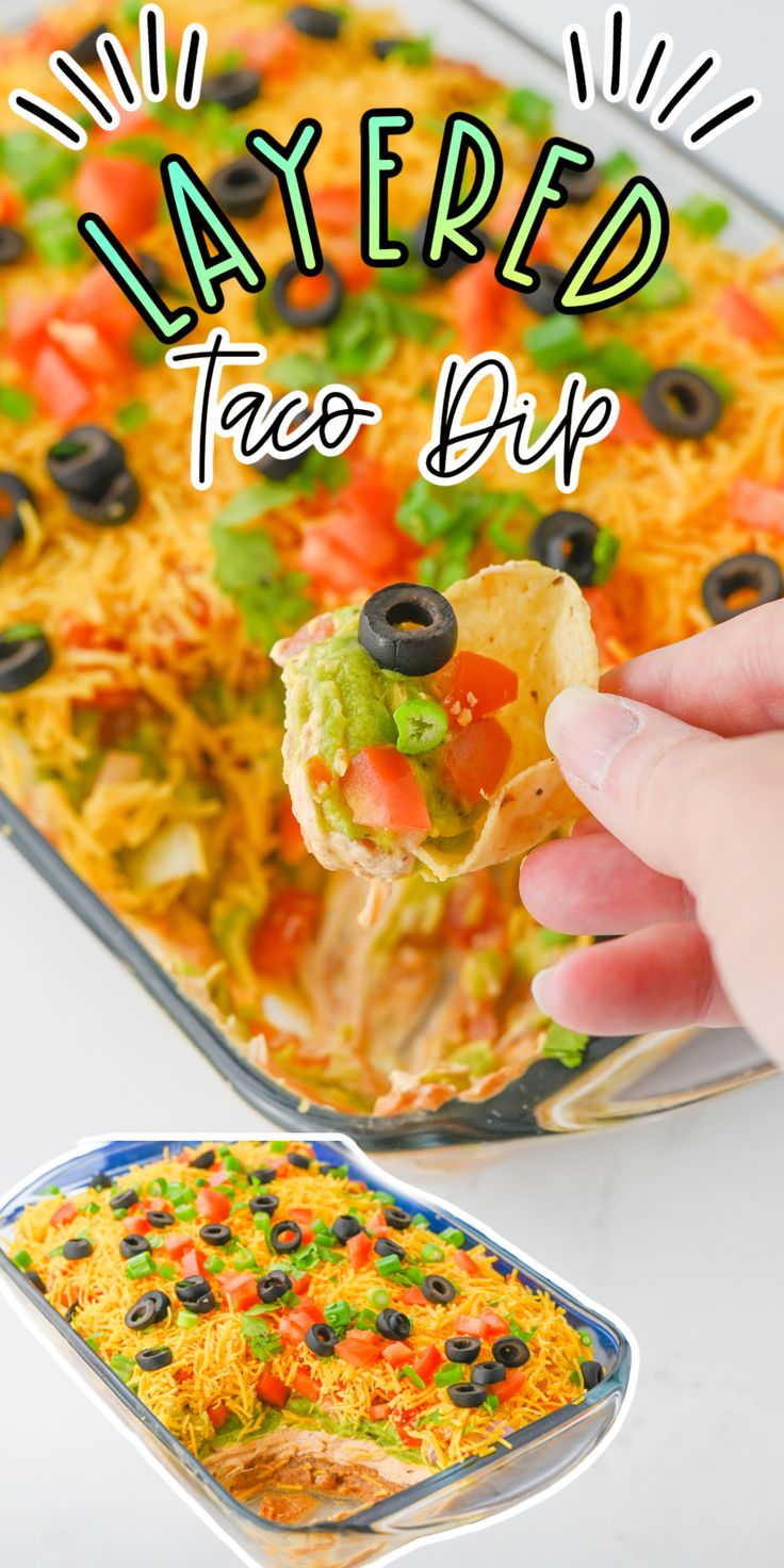 a hand holding up a tortilla chip with black olives and green peppers