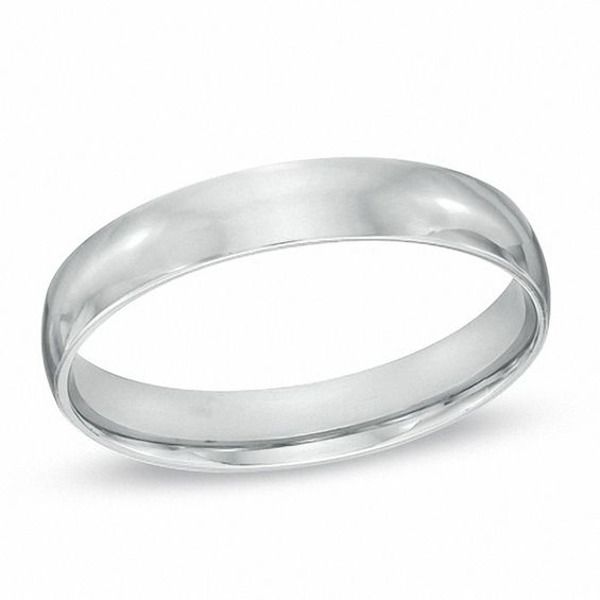 a white gold wedding ring on a white background