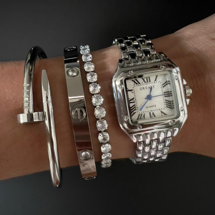 Description And Details: - Diameter 25mm - Stainless Steel - No Waterproof Silver Tennis Bracelet Stack, Silver Bracelet Stack With Watch, Classy Bracelet Stack, Bracelet Stacks Silver, Silver Watch Stack, Silver Stacking Bracelets, Silver Stack Jewelry, Stacked Bracelets Silver, Silver Jewelry Stack