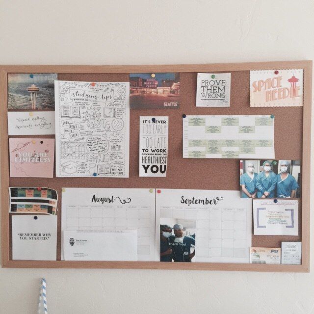 a bulletin board with pictures and magnets on it