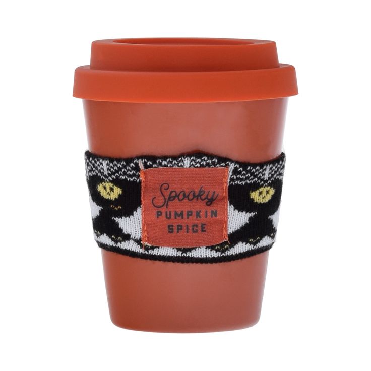 a cup with a label on it that says spooky pumpkin spice