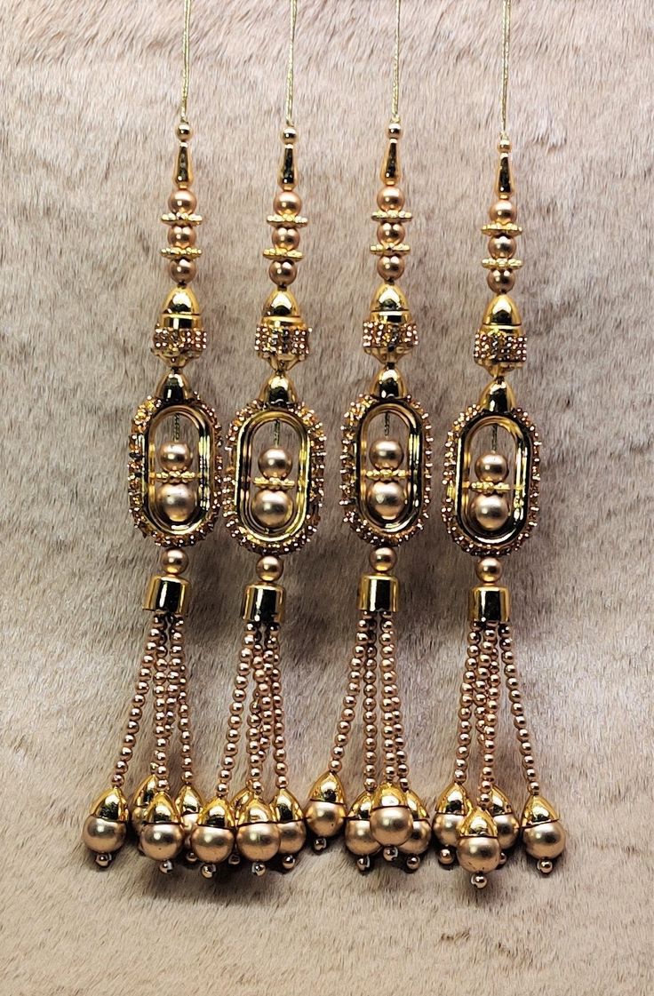 Indian Handmade Beaded Latkan Tassels for Saree Blouse HandBags Hangings Dupatta Bridal Wedding dress for Women pair of 2 pcs Size - 23.0 cm Length  2 Latkan / 1 Pair Item Description You can use this Beautiful pair of tassle for several DIY projects.  *These beautiful Tassel Latkans are used as the accessory for saree blouse on the back, but u can use according to your need and your innovative ideas. Other Than Saree Blouse, you can use these latkans in various ways Craft Projects Designing Home Decoration Festive celebrations. Evening and party Apparels. Home décor items Apparel & Fashion Scarves n Stoles Table cover, curtains, Pillow covers, Cushion cover Table cover, curtains Designing stylish blouses Ship From New Delhi, India Tassels For Saree, Latkan Tassels, Dupatta Bridal, Wedding Dress For Women, Stylish Blouses, Fabric Balls, Indian Bridal Lehenga, Bridal Wedding Dress, Blouse Saree