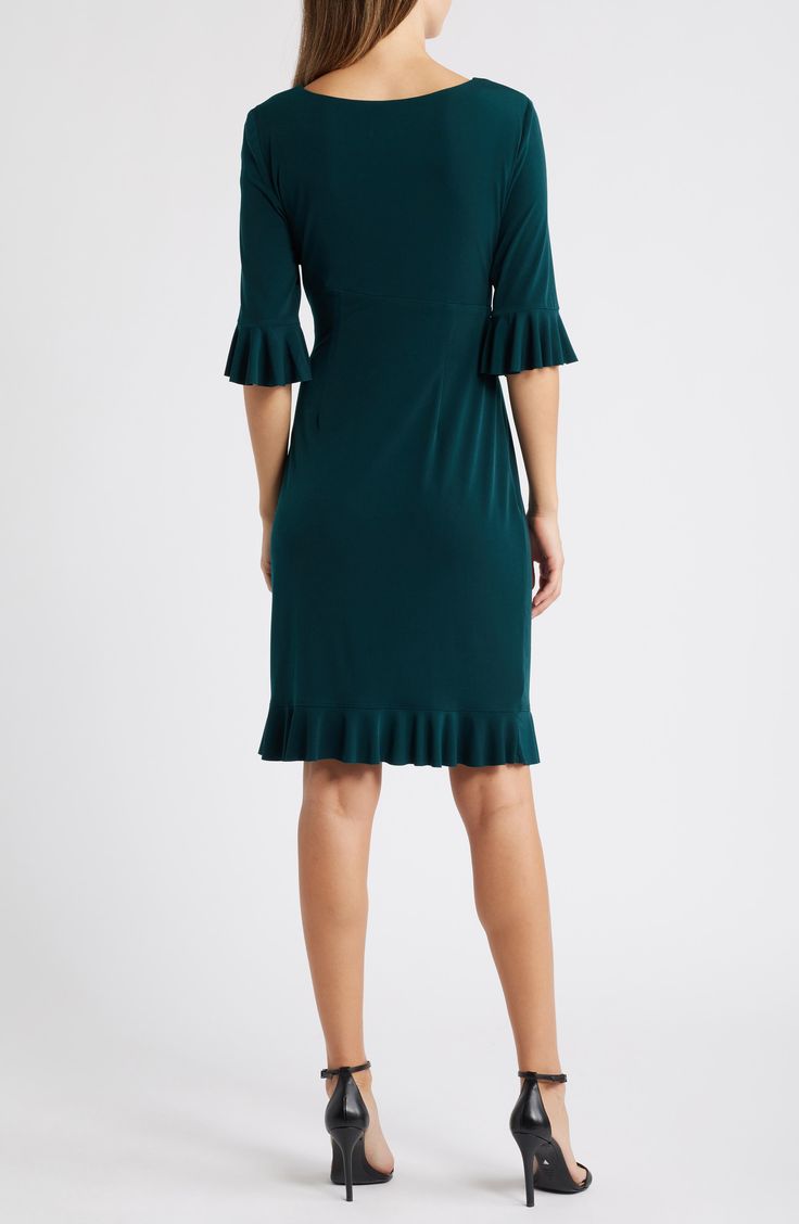 Stretch-enhanced fabric offers desk-to-dinner comfort in a dress framed by ruffled sleeves and finished with front pleats for a gathered affect. 40" length (size 8) Jewel neck Elbow-length sleeves Partially lined 100% polyester Machine wash, tumble dry Imported Elegant V-neck Pleated Dress With Ruffles, Fitted V-neck Pleated Dress With Ruffles, Elegant Green V-neck Ruffle Dress, Elegant Viscose Midi Dress With Gathered Sleeves, Fitted Viscose Dress With Ruffles, Fitted Ruffled Dresses In Viscose, Fitted Ruffle Dresses In Viscose, Elegant Stretch Dresses With Ruffles, Fit And Flare Knee-length Midi Dress With Ruffle Hem