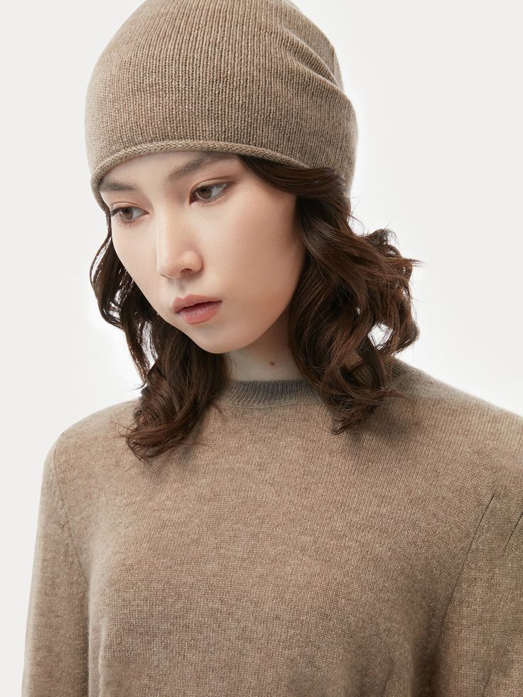 A basic with endless possibilities. The Basic Crew Neck Sweater with a lightweight hat is an ideal layering piece both for your current wardrobe and the one you dream about. Throw it over a button-down shirt for a smart, casual look, or layer over a dress for laid-back chic. Creamy yet lightweight, it's a must-have for your collection. The color of our cashmere is just as nature intended. Each shade is determined not by dye, but by the ecological diversity and deep-rooted culture of the Mongolia Classic Solid Color Cloche Hat For Fall, Classic Solid Cloche Hat For Fall, Classic Fall Cloche Hat, Classic Cashmere Winter Hat, Classic Beige Winter Hat, Everyday Fall Beanie, Classic Beige Beanie For Winter, Classic Solid Beanie For Fall, Classic Beanie Hats For Fall