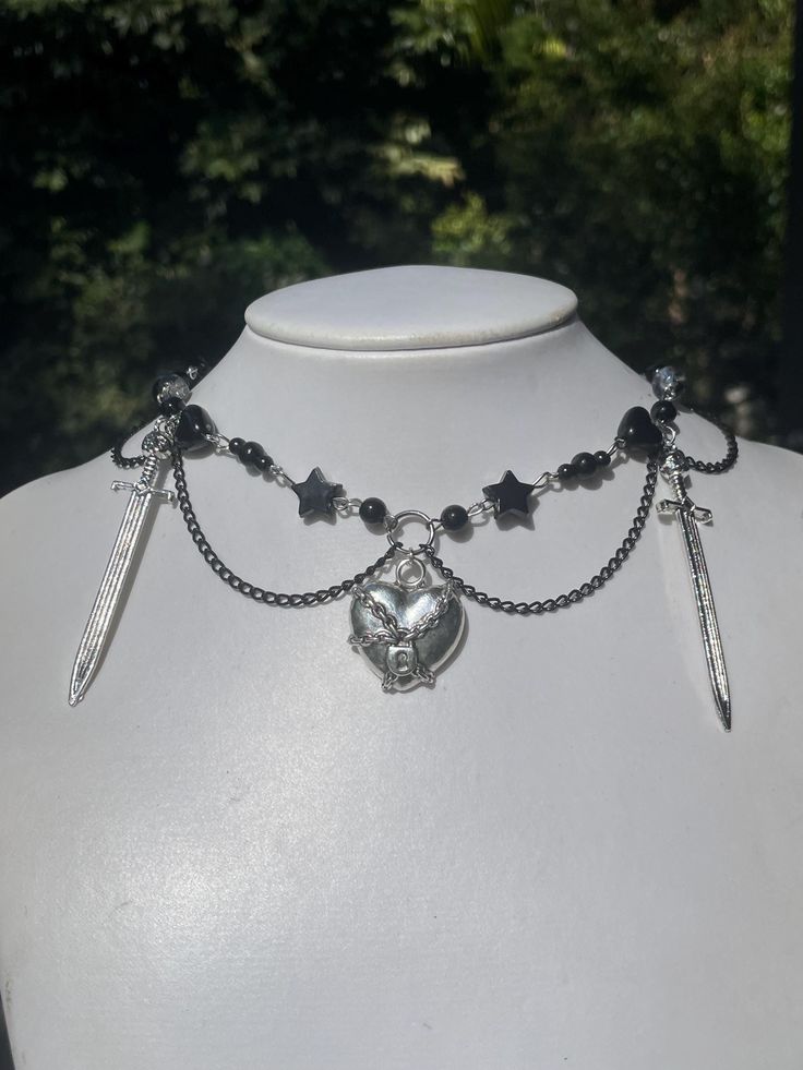 Handmade and one of a kind Handmade Gothic Dangle Necklaces, Unique Heart-shaped Festival Jewelry, Heart-shaped Silver Choker For Festivals, Silver Heart Choker For Festivals, Silver Heart-shaped Jewelry For Festival, Unique Metal Necklace With Heart Charm, Vintage Heart Necklaces For Festivals, Heart Beads Choker For Jewelry Making, Gothic Heart Charm Choker Jewelry