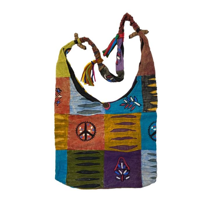 These bright, colorful, handcrafted bags make a great gift. Spacious and comfortable, they are perfect for travel or a casual day out. Available as shoulder bags or backpacks. Shoulder bags have a both a zipper and button closure, as well as an extra inside zipper pocket. Backpacks have a button and drawstring closure, adjustable straps, and loop for hanging. Please choose style in drop down menu. Photos show examples of bag styles. Colors are miscellaneous and will vary. Made of 100% cotton. Casual Multicolor Shoulder Bag, Casual Multicolor Canvas Tote Bag, Casual Multicolor Square Canvas Bag, Casual Multicolor Canvas Travel Bag, Multicolor Casual Canvas Travel Bag, Casual Multicolor Satchel Canvas Bag, Casual Multicolor Rectangular Beach Bag, Summer Cotton Backpack, Casual Multicolor Hobo Tote Bag