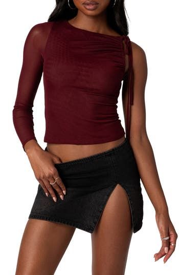 Rock an edgy night-out vibe in this asymmetric top designed with a single sheer sleeve and ruched accents. Jewel neck Single long sleeve 95% polyester, 5% spandex Machine wash, dry flat Imported Trendy Asymmetrical Ruched Top, Asymmetrical Ruched Fitted Blouse, Fall Ruched Asymmetrical Top, Trendy Fitted One Shoulder Top With Ruched Detail, Trendy Fitted One-shoulder Top With Ruched Detail, Asymmetrical Ruched One Shoulder Top For Night Out, Sheer Asymmetrical Top For Spring, Sheer Asymmetrical Spring Tops, Trendy Fitted One Shoulder Top With Asymmetrical Hem