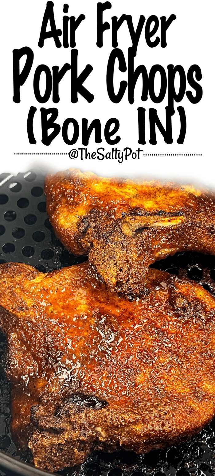 air fryer pork chops in the skillet with text overlay that reads, air fryer pork chops bone in