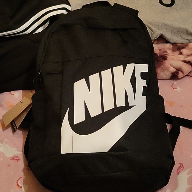 Brand New Never Used! Nike Backpacks For School, Nike Heritage Backpack, Black Letter Print Backpack For Students, Nike Bags Backpacks, Nike Black Backpack For Back To School, White Letter Print Backpack For Students, Nike Bookbag, Nike White Functional Backpack, White Nike Functional Backpack