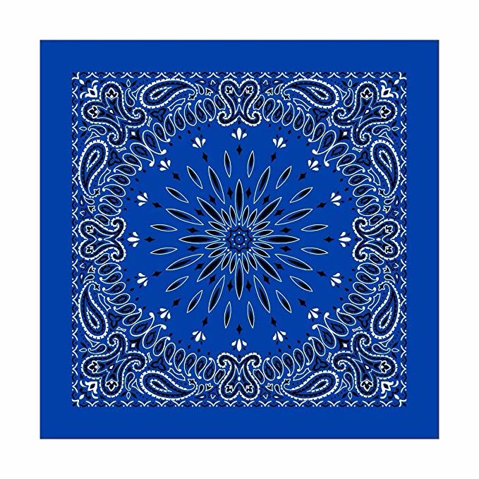 a blue and white bandanna with an intricate design in the center on a dark blue background