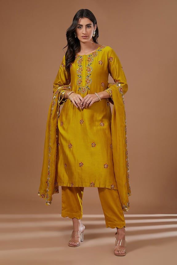 Mustard yellow three fourth sleeves A-line kurta with blossom multithread, sequin, golden dori embroidery on the placket and floral cluster motif highlights. Paired with a scallop hem straight pant and floral embroidered scallop border organza dupatta. - Aza Fashions Dori Embroidery, Scallop Border, Kurta Pant Set, A Line Kurta, Pant Set For Women, Scallop Hem, Organza Dupatta, Kurta With Pants, Silk Embroidery