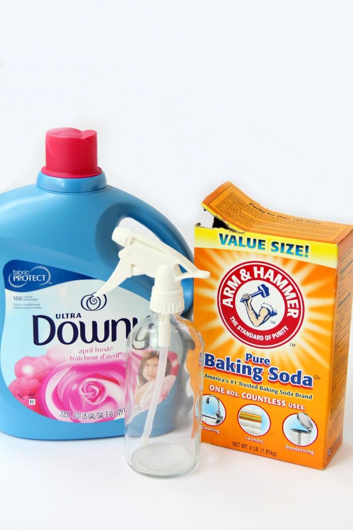 a bottle of detergent, soap and baking soda next to a carton of dawn