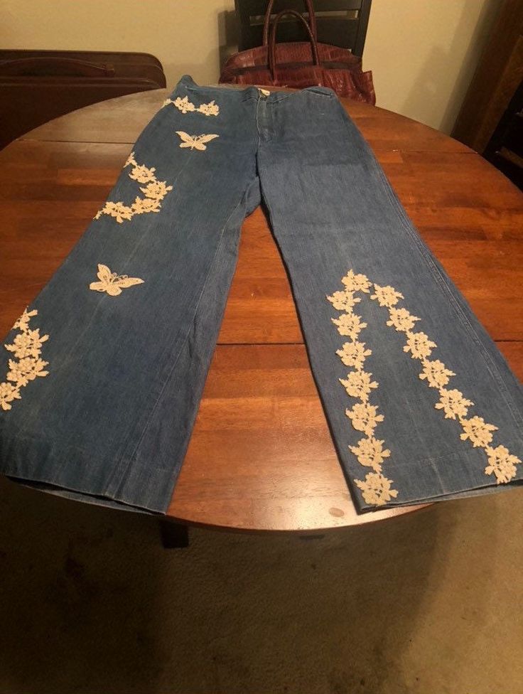 Around a size medium vintage 1970s jeans by Petit Fors Los Angeles. Front snap needs to be redone as shown. Could be worn tight or baggy. Will fit a variety of sizes. California vintage wide leg/bell bottom pants.  Measurements  Waist about 15 inches across (30 inch waist)  Rise about 13 inches  Hip about 10 to 10.5  Full Hip is about 20 inches  Cuff is just under 12 inches 70s Inspired Wide Leg Jeans For Spring, Vintage High Rise Pants For Spring, Vintage Full Length Bottoms For Spring, Spring Vintage Full Length Pants, Vintage Wide Leg Bottoms, Vintage Wide Leg Fitted Bottoms, Vintage Fitted Wide Leg Bottoms, Vintage High-rise Pants For Spring, Vintage High Waist Spring Flares