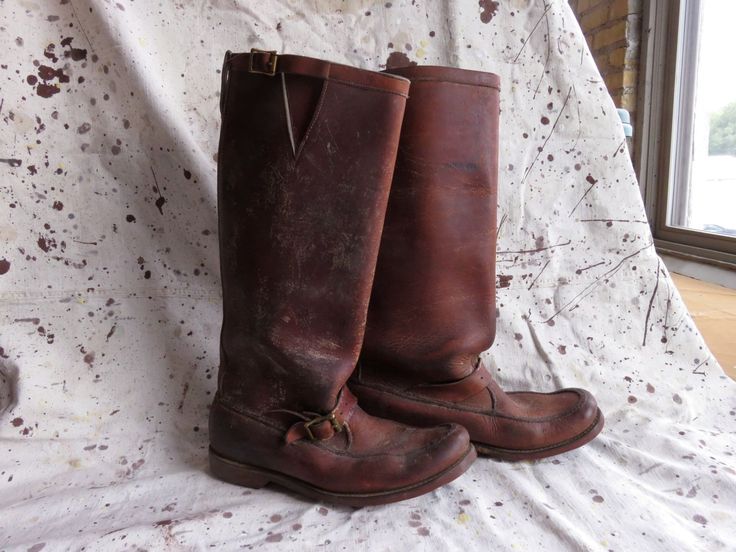 "Amazing pair of estimated 1940s Abercrombie & Fitch hunting boots, very likely made for Abercrombie stores by Gokey of St. Paul, Minnesota- identical in every detail to Gokey \"botte sauvage\" snake proof boots.  Very thick heavy leather throughout. In excellent condition for age, heavy waxy coating, general patina from use, some scuffs and surface wear to leather; very wearable, soles are excellent. No size marked, fits US Men's 11. Exterior sole measures approx. 13 inches, interior insole mea Vintage Fitted Moto Boots With Leather Sole, Vintage Moto Boots With Round Toe For Outdoor, Vintage Fitted Moto Boots With Round Toe, Fitted Vintage Boots With Goodyear Welted, Fitted Vintage Boots With Goodyear Welt, Vintage Round Toe Boots For Ranch, Vintage Outdoor Boots Goodyear Welted, Vintage Outdoor Boots With Goodyear Welted, Vintage Outdoor Boots With Goodyear Welt