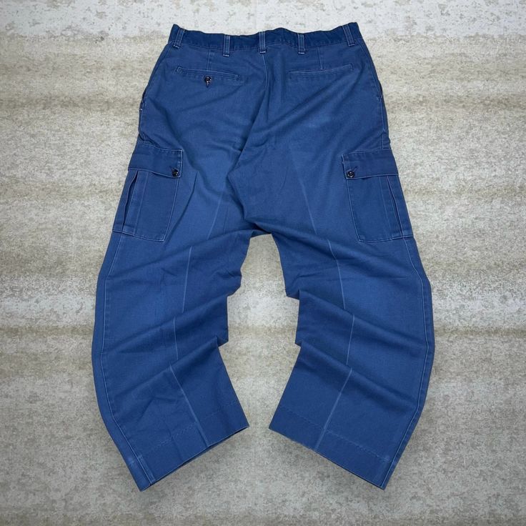 Vintage Red Kap Cargo Pants Navy Blue Baggy Fit Made in USA Flat Front Y2K Skate / Streetwear Great Condition: 9/10 Men's Size:  Waist: 36" Length (inseam): 30" Leg Opening: 9" Thigh Opening: 13" Front Rise: 13" Baggy Retro Cargo Pants, Baggy Cotton Retro Bottoms, Retro Baggy Full-length Bottoms, Retro High Waist Cargo Jeans With Pockets, Retro High Waist Cargo Jeans, Retro Full-length Baggy Bottoms, Retro High-waist Cargo Jeans With Pockets, Retro Full Length Baggy Bottoms, Navy Wide Leg Cotton Pants