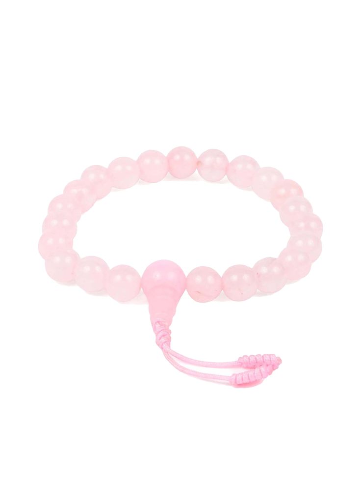 Wear this Rose Quartz Wrist Mala in meditation or anytime you want to feel connected to love and beauty. Rose Quartz is considered the universal stone of peace and unconditional love. Strung on a band with a 3-inch diameter with some stretch to fit most wrists comfortably. May have a pink tassel or braided cord. Made in Nepal. Beads: 23, 7 mm Love And Beauty, Wrist Mala, Pink Tassel, Unconditional Love, Nepal, Live Lokai Bracelet, Rose Quartz, Tassels, Meditation