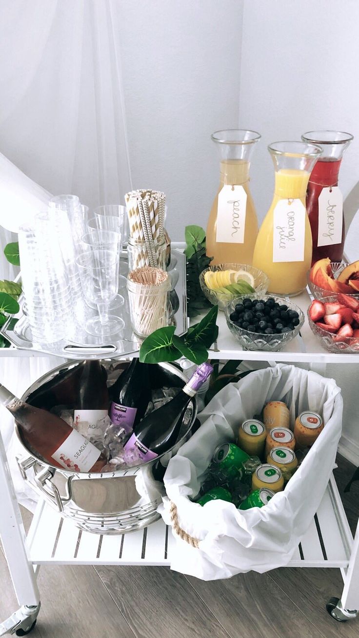 an assortment of condiments and drinks on a table