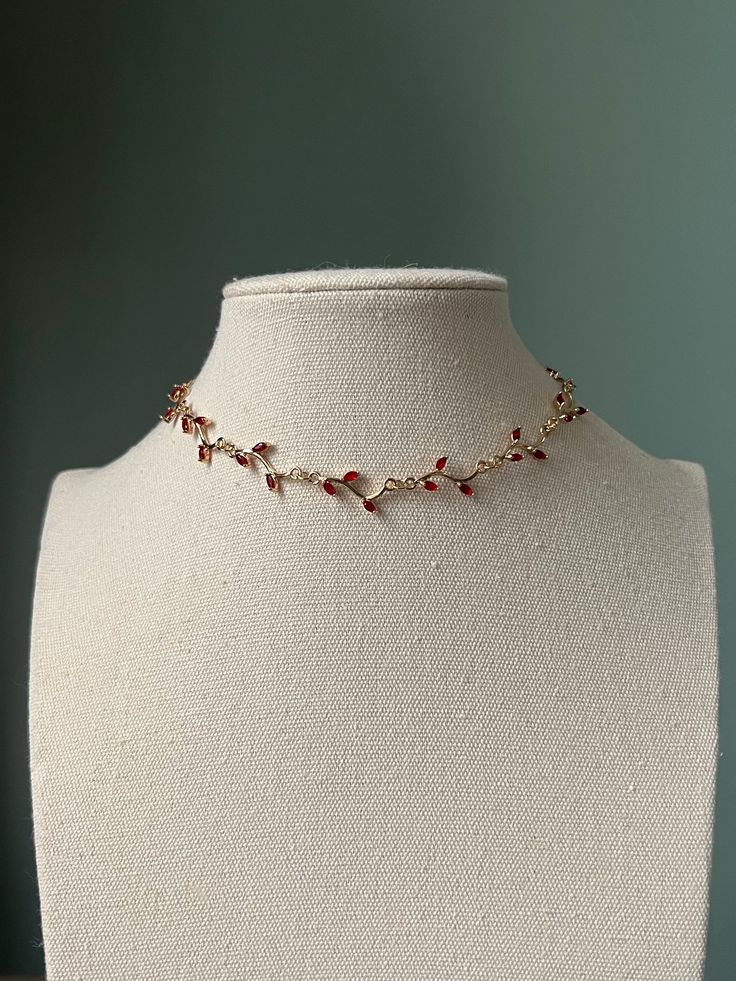 Delicate red leafy vine  choker necklace, Gold summer wedding bridal necklaces A perfect treat yourself gift or a gift for a loved one!  Heart shaped necklace chain is made from 16k gold plated stainless steel.  Necklace is 35cm with 6cm extending chain. If you would like a different length please message me :)  Pendants are made from copper and cubic zirconia   Do not hesitate to ask if you have any questions :) Bridal Necklace Layering, Pretty Chain Necklaces, Red Dress Necklace, Open Choker Necklace, Jewellery Choker Necklace, Gold Necklace With Red Stone, Cute Necklace Gold, Red Prom Dress Gold Jewelry, Delicate Red Jewelry For Valentine's Day