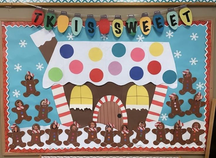 a bulletin board with gingerbread houses and candy