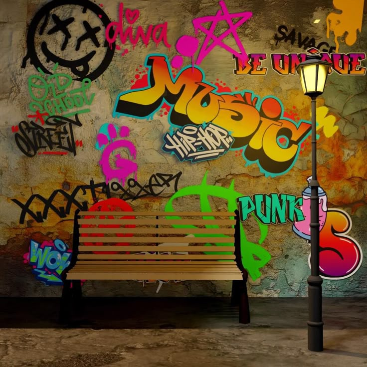 a wooden bench sitting in front of a graffiti covered wall