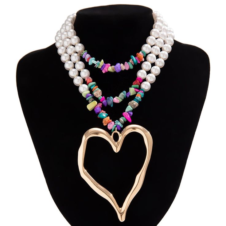 Description: Boho Colorful Layered Turquoise Pearl Chain Heart Pendant Choker Necklace Specifications: Material: Alloy Metal, Artificial Pearl, CCB, TurquoiseSize: 11.8" + 2.7" extWeight: 3.26 oz/pcColor: colorful Features & Details:Pearls are symbolic of wisdom gained through experience. The gems are believed to offer protection, as well as attract good luck and wealth.This Boho Colorful Layered Turquoise Pearl Chain Heart Pendant Choker Necklace is made of nickel-free, lead-free, cadmium-free Detailed Necklace, Turquoise Heart, Multi Layer Necklace, Boho Accessories, Holiday Style, Pearl Types, Boho Vintage, Colourful Necklace, Pearl Choker