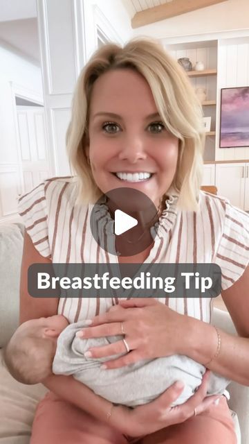 a woman sitting on a couch holding a baby in her lap with the caption breastfeeding tip