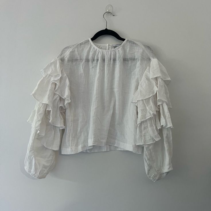 Rebecca Ruffle Top Olivaceous Msrp $48 100% Cotton In Color White Spring White Blouse With Ruffle Hem, White Spring Blouse With Ruffle Hem, White Ruffle Hem Blouse For Spring, Spring Ruffled Collar Top For Brunch, Feminine Ruffled Tops For Day Out, White Blouse With Ruffle Hem For Spring, Spring Ruffled Tops For Brunch, Spring Brunch Tops With Ruffled Collar, Spring Brunch Tops With Ruffles