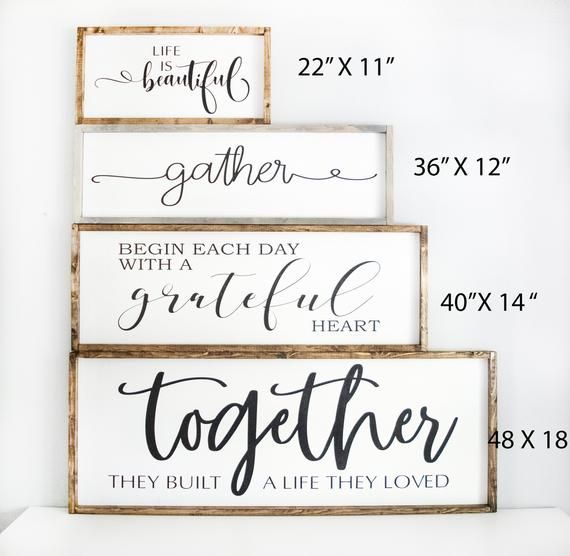 three wooden signs with the words together on them, and one is for each other