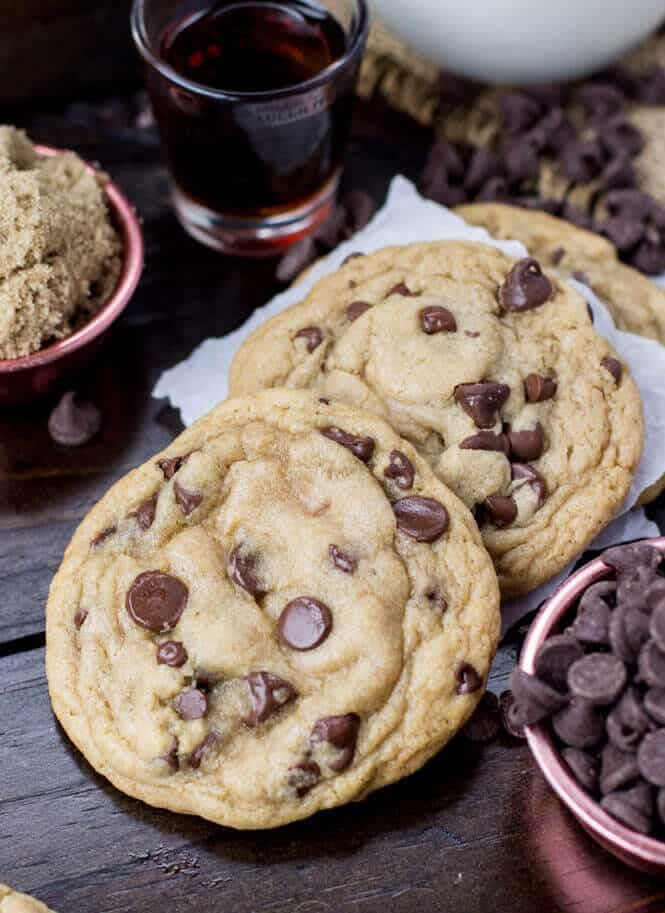 chocolate chip cookies and coffee are on the table