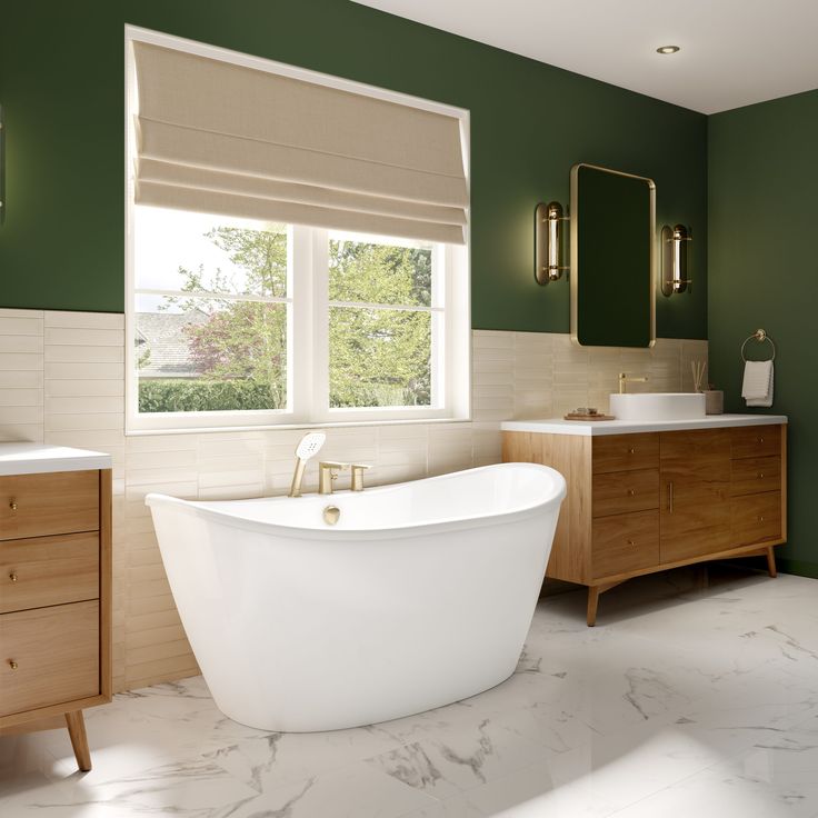 a bathroom with green walls and marble flooring is pictured in this image, there is a large bathtub next to the window