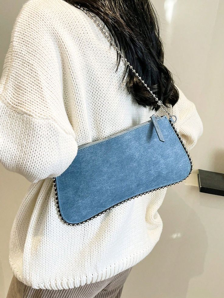 Elevate your style with our Vintage Denim Blue Asymmetric Beaded Chain Shoulder Bag. This one-of-a-kind bag adds personality to any look with its unique, eye-catching design. The beaded chain strap adds a touch of elegance, while the vintage denim blue color offers a retro feel. Enhance your wardrobe with this must-have accessory. Color : Blue Details : Chain, Beaded Magnetic : No Type : Novelty Bag Bag Size : Medium Style : Vintage Strap Type : Chain Pattern Type : Plain Closure Type : Zipper Composition : 100% Polyurethane Material : PU Leather Bag Height Bag Length Bag Width Handle Height 15 30 1 28 Pu Leather Bag, Stylish Letters, Stylish Mom, Straw Tote Bag, Fashion Tote Bag, Novelty Bags, Add Personality, Chain Shoulder Bag, Bird In Bag