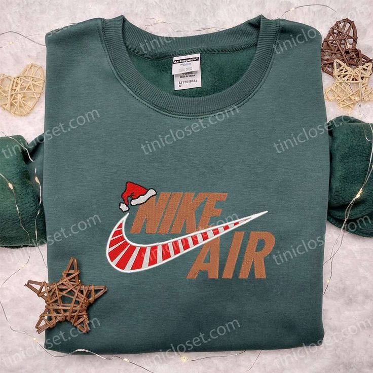 Introducing the Nike Air Christmas Logo Embroidered Shirt, a must-have for all sneaker enthusiasts and holiday lovers! This shirt showcases Casual Embroidered Christmas Top, Casual Christmas Tops With Embroidered Graphics, Casual Christmas Sweatshirt With Custom Embroidery, Casual Embroidered Sweatshirt For Holiday, Christmas Cotton Sweatshirt With Embroidered Logo, Holiday Embroidered Casual Sweatshirt, Casual Embroidered Holiday Sweatshirt, Casual Holiday Embroidered Sweatshirt, Casual Christmas Crew Sweatshirt