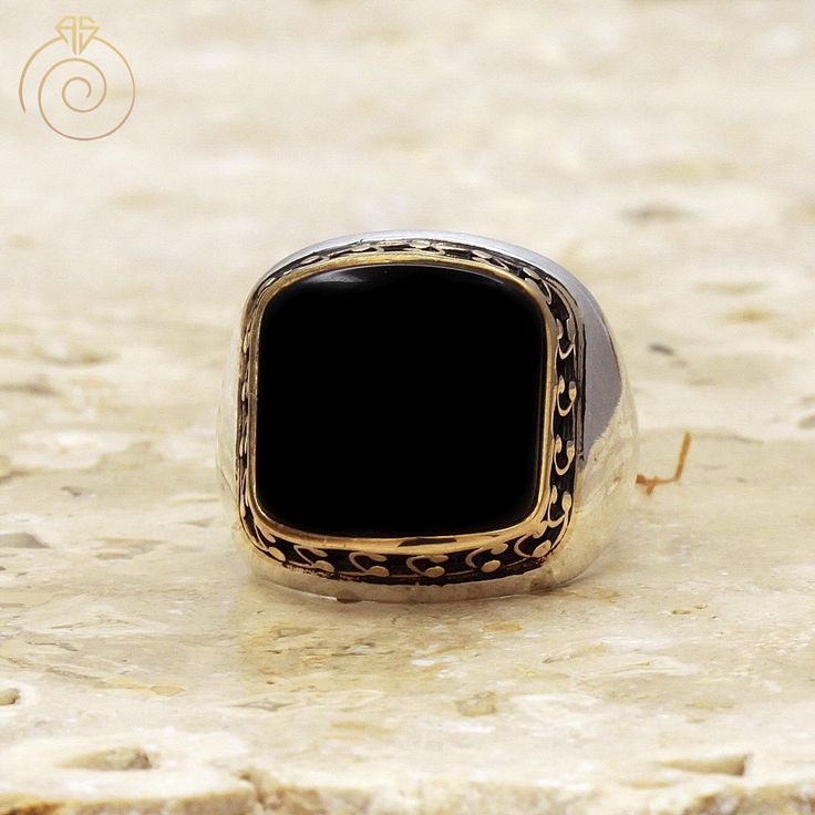 "It is a 925 Sterling Silver Mens Ring which has polished smooth mould and a curved Onyx Gemtone. There is Arabic protection Vaw letters engraved on the frame of stone. One of high quality handmade silver ring from our designs. All my designs are coming from a passion. Has 1 year guaranty for the production mistakes. Stone : Onyx Gemstone Material: Sterling Silver 925k and Bronze (yellow parts) Plated: Rodium Plated Weight: 17.00gr Please make sure you have correct measurements from the size car Black Engraved Ring With Polished Finish For Formal Occasions, Formal Black Engraved Ring With Polished Finish, Elegant Formal Signet Ring Stamped 925, Luxury Black Engraved Ring For Formal Occasions, Silver Onyx Signet Ring Luxury Style, Luxury Silver Onyx Signet Ring, Luxury Silver Signet Ring With Onyx, Formal Onyx Rings Stamped 925, Mens Ruby Ring