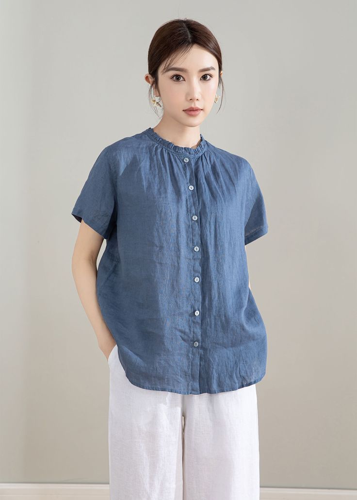 "Our blue linen shirt, loose, comfortable and versatile. It is practical enough to tuck into your favorite shirt, our blouse can also pair with skinny jeans, yes, it is a good choice for women tops.This shirt can be worn on both sides. Why Good selection with linen shirt? The main benefit of wearing linen clothes in hot weather is the coolness they provide. Linen is highly absorbent and a good conductor of heat. Your linen garment feels cool to the touch and linen fabric will quickly remove pers Linen Workwear Top, Solid Linen Tops For Work, Casual Flax Tops For Spring, Solid Linen Top For Work, Solid Ramie Tops For Spring, Casual Ramie Top For Spring, Spring Flax Button-up Top, Flax Button-up Tops For Spring, Relaxed Fit Ramie Blouse