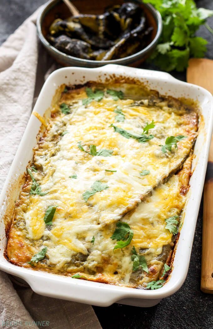 a casserole dish with cheese and herbs