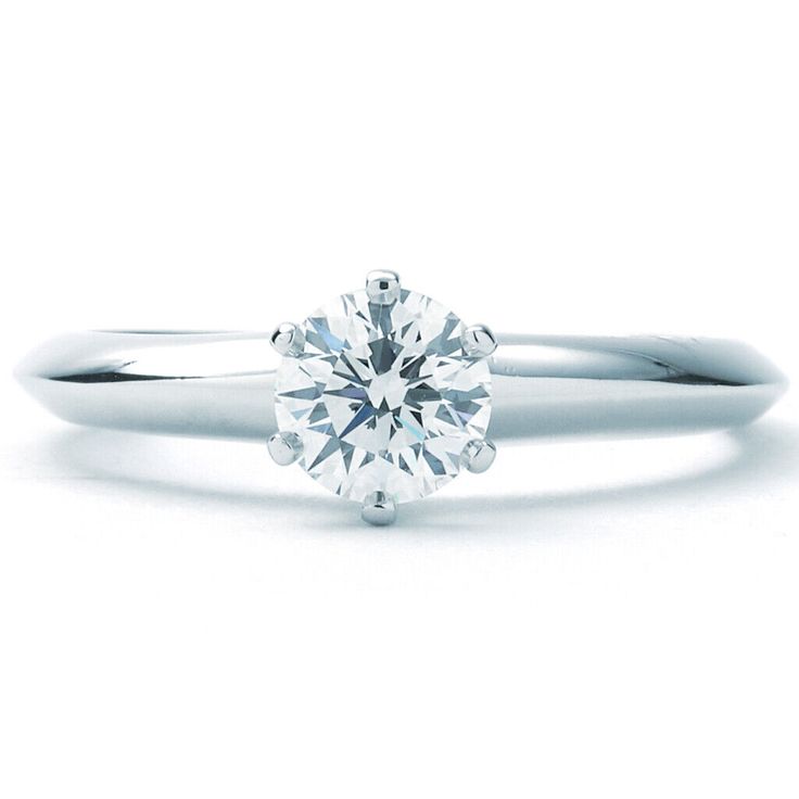 Product Description This listing is for a previously-owned Tiffany & Co. Solitaire Collection ring. The ring is a size 4.75 (US), made of platinum, and weighs 2.60 DWT (approx. 4.04 grams). It also has one round I-color, VS2-clarity diamond weighing 0.53 CTTW. Designer Tiffany & Co. Weight 2.60 DWT Collection Solitaire Ring Size 4.75 Condition Pre-owned Ref. Number R448570 Metal Platinum Packaging and Additional Features This Tiffany & Co. Solitaire  ring comes with  an original box and an original appraisal. * All sizes are approximate. New York Jewelers © 2019 All pictures are of the actual item. Please Note We ship all packages signature required. We do not ship to PO Boxes. Payment must be completed within 36 hours of sale, otherwise the item is relisted and a case is opened. About New Platinum Diamond Ring With Prong Setting, Diamond White Platinum Ring With Brilliant Cut, Platinum Rings In Diamond White With Brilliant Cut, Classic Platinum Ring With Classic Cut, Platinum Diamond White Round Band Ring, Platinum White Gold Diamond Ring With Brilliant Cut, Formal Platinum Rings With Classic Cut, Platinum Rings For Formal Occasions With Classic Cut, Classic White Gold Diamond Ring In Platinum